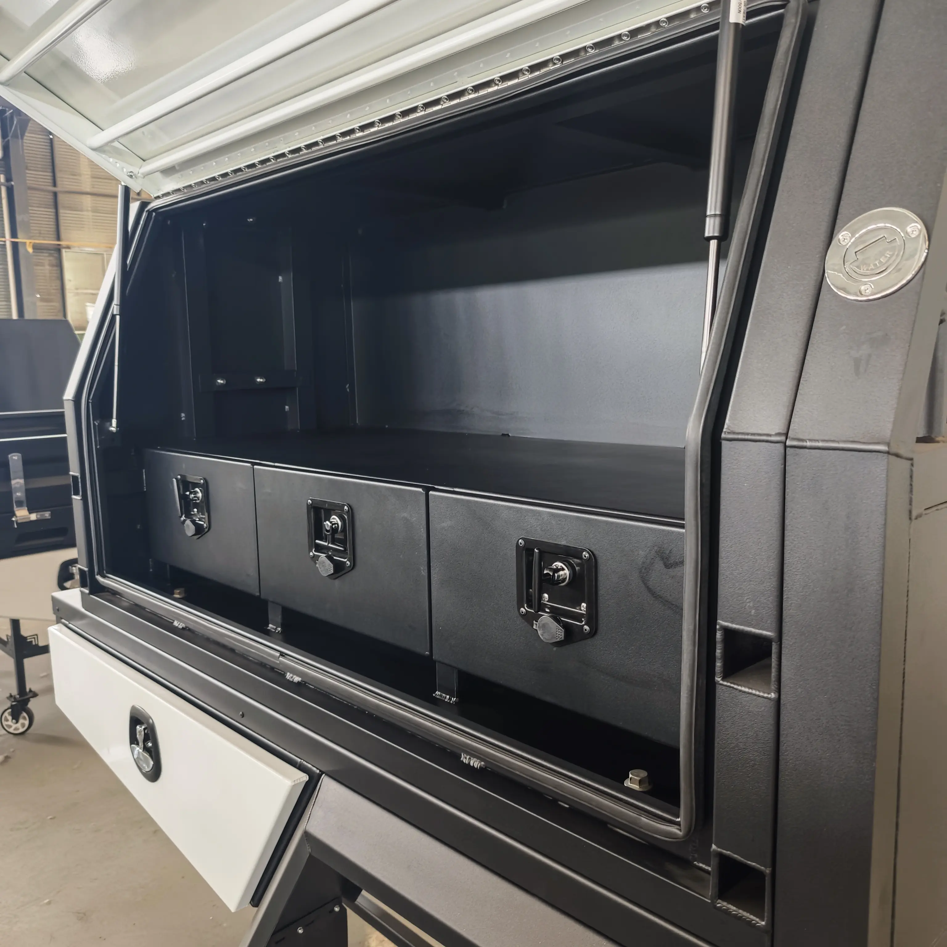 Side-opening canopy module with storage access
