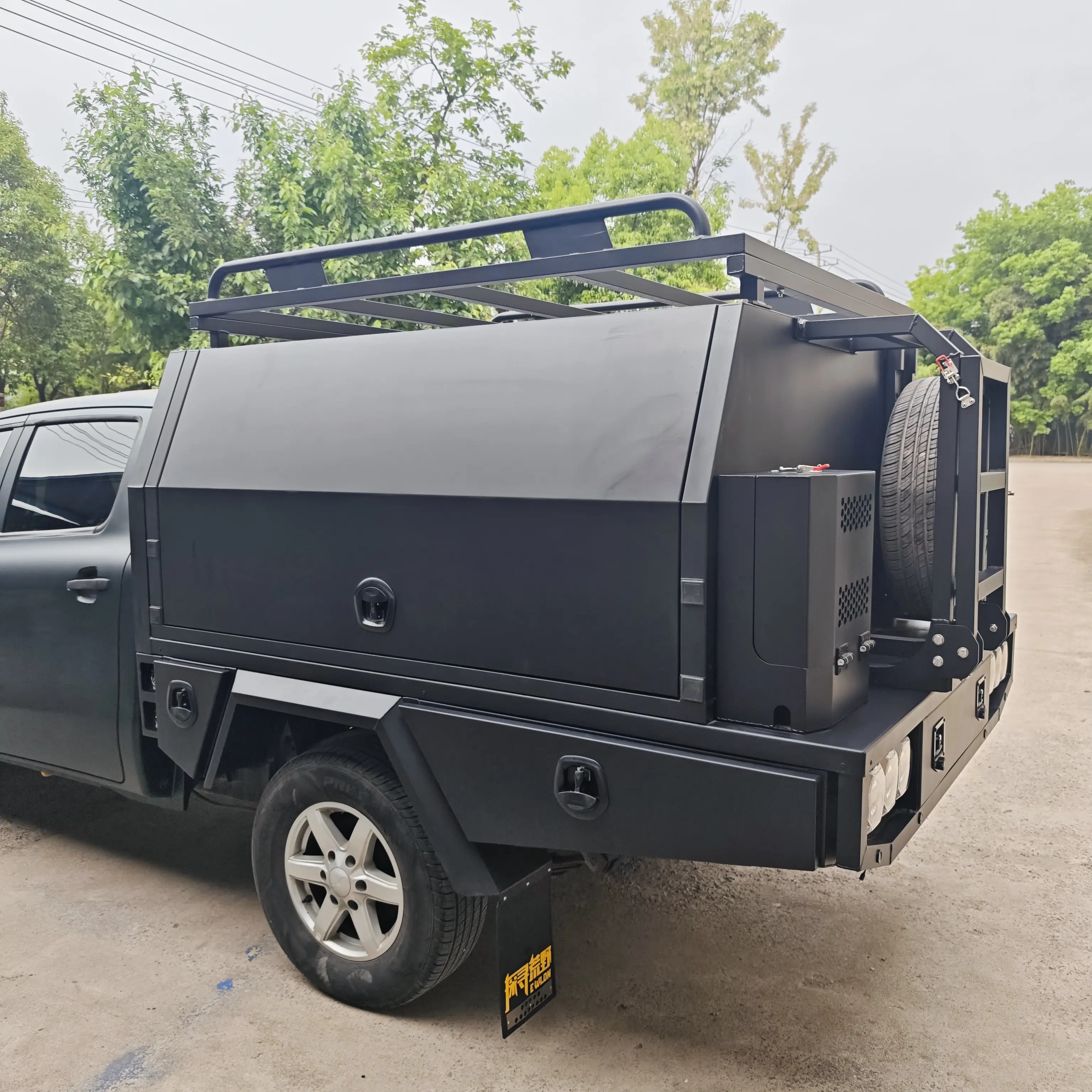Pickup camper module with exterior rack and storage body